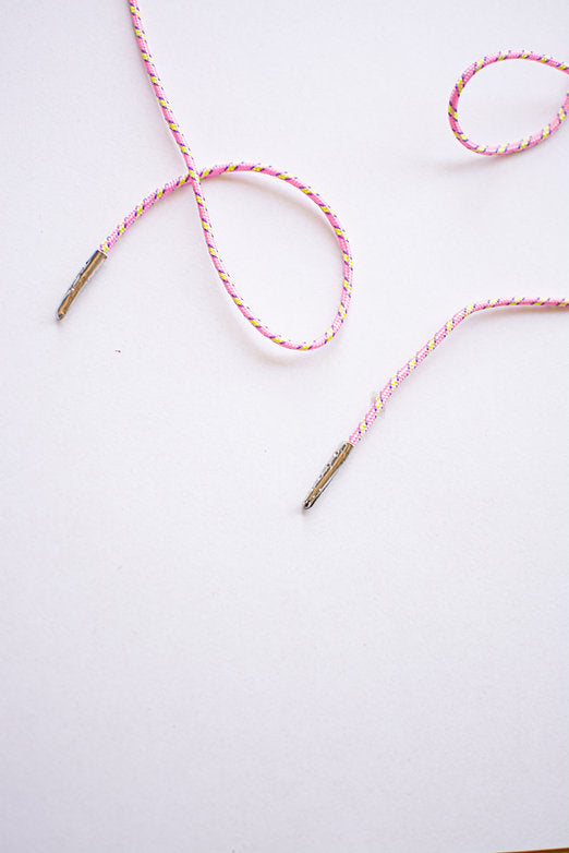 Schoenveters rond koord roze geel gestreept