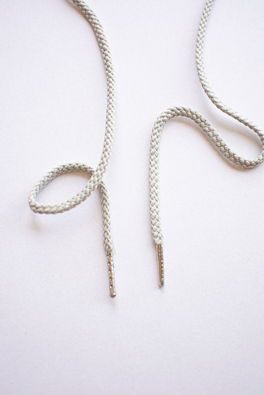 Schoenveters rond koord licht grijs