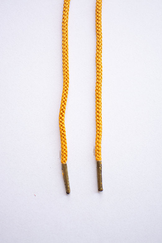 Schoenveters rond koord mosterd geel