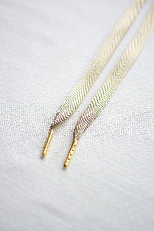 Gold Rush – metallic sneaker-veters in goud