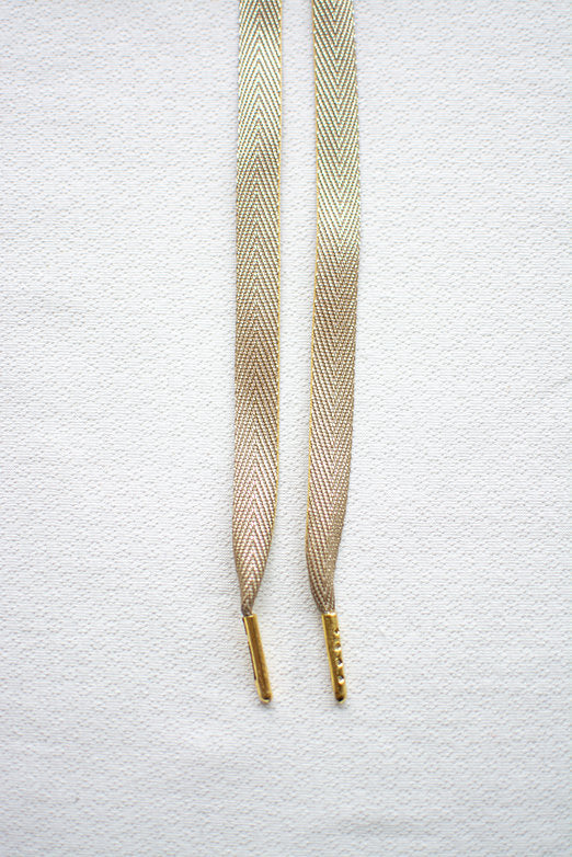 Gold Rush – metallic sneaker-veters in goud